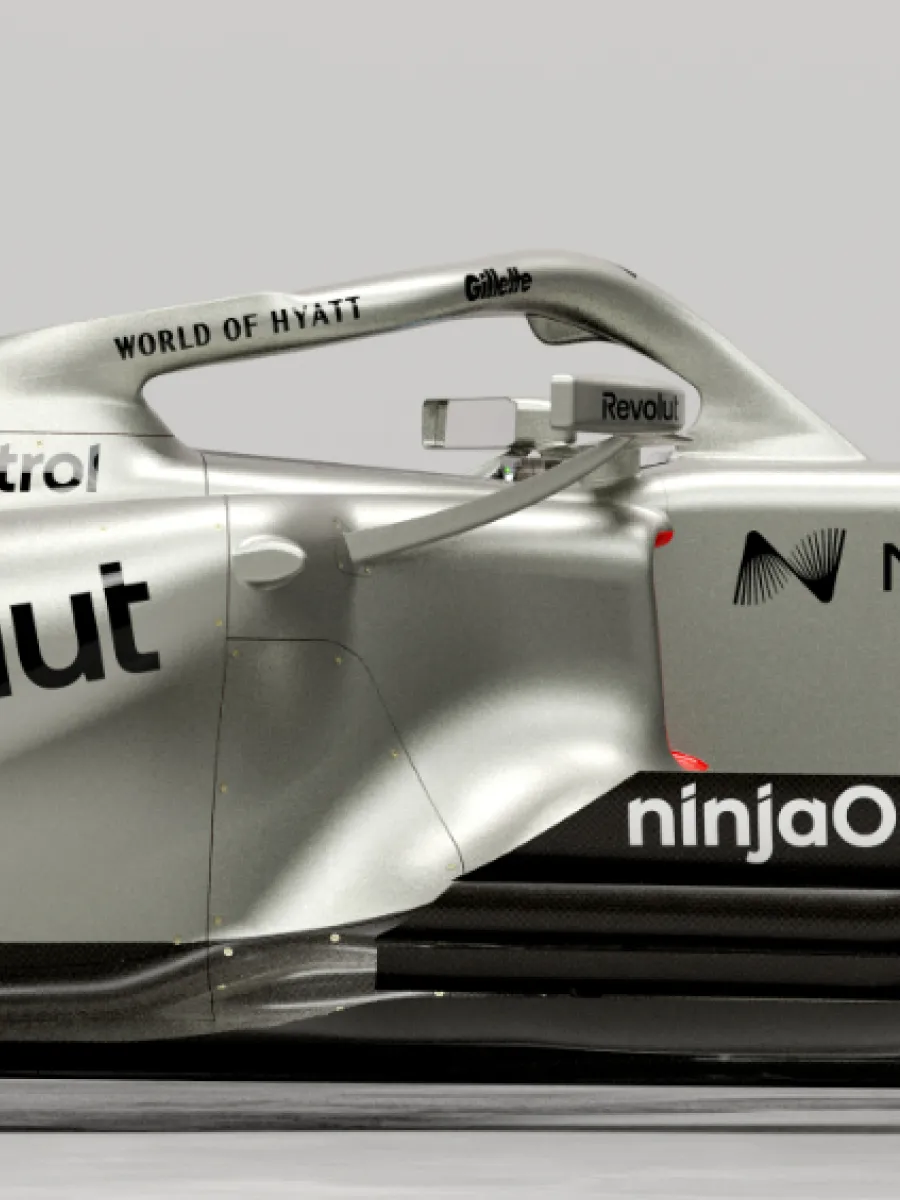 Audi Revolut F1® Team car R26 next to the Audi RS 5 in the studio