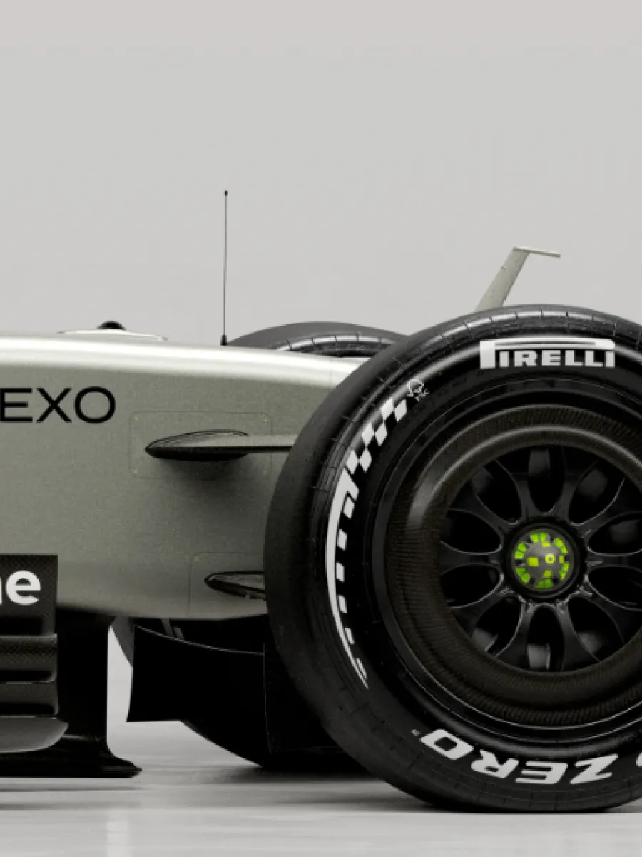Audi Revolut F1® Team car R26 next to the Audi RS 5 in the studio