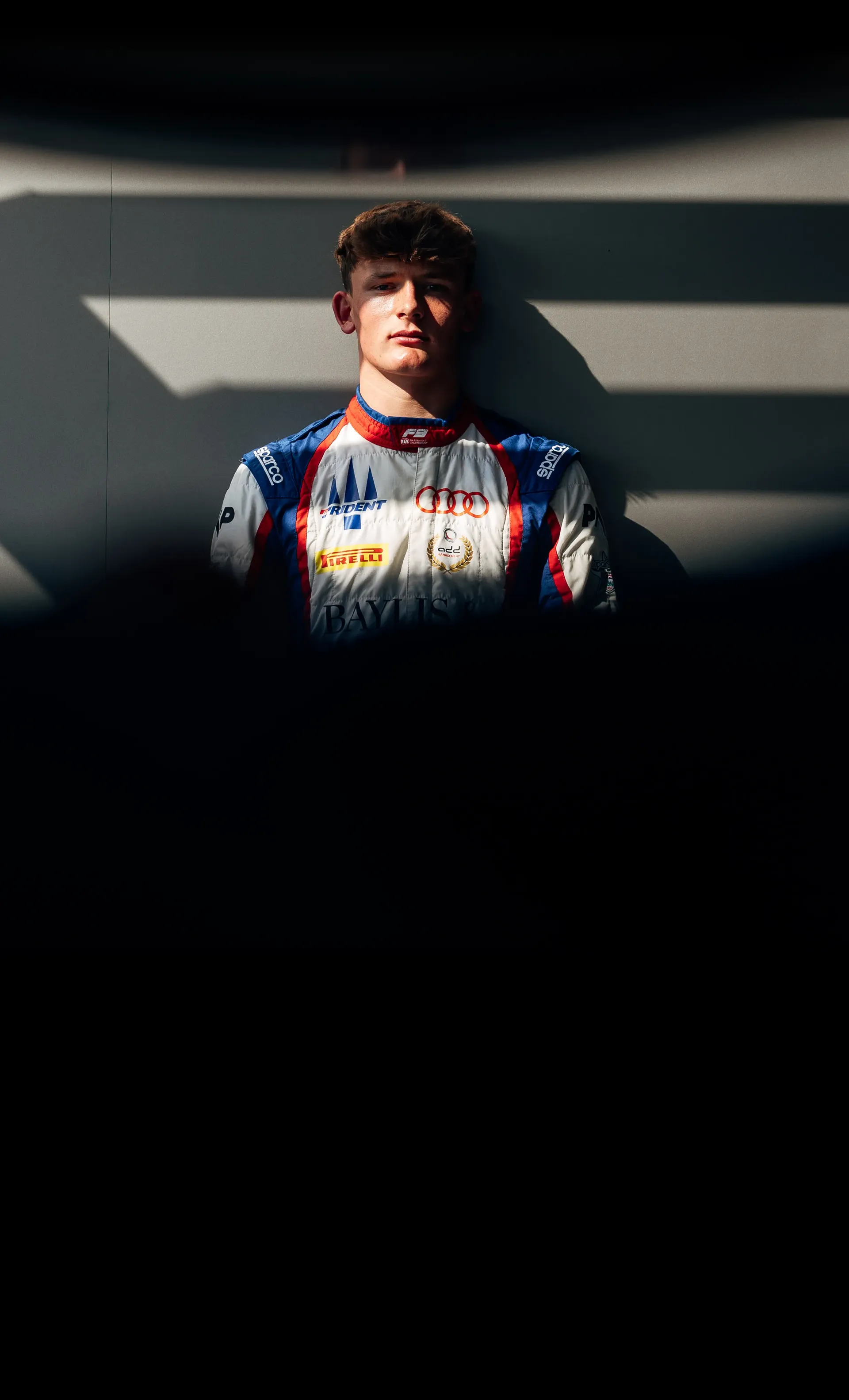 Front Close up of Audi Revolut F1® Team Academy F3 driver Freddie Slater in the garage