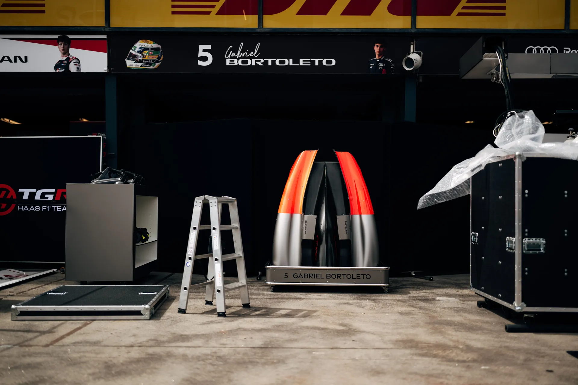 Engine cover from Gabi standing in front of the box 