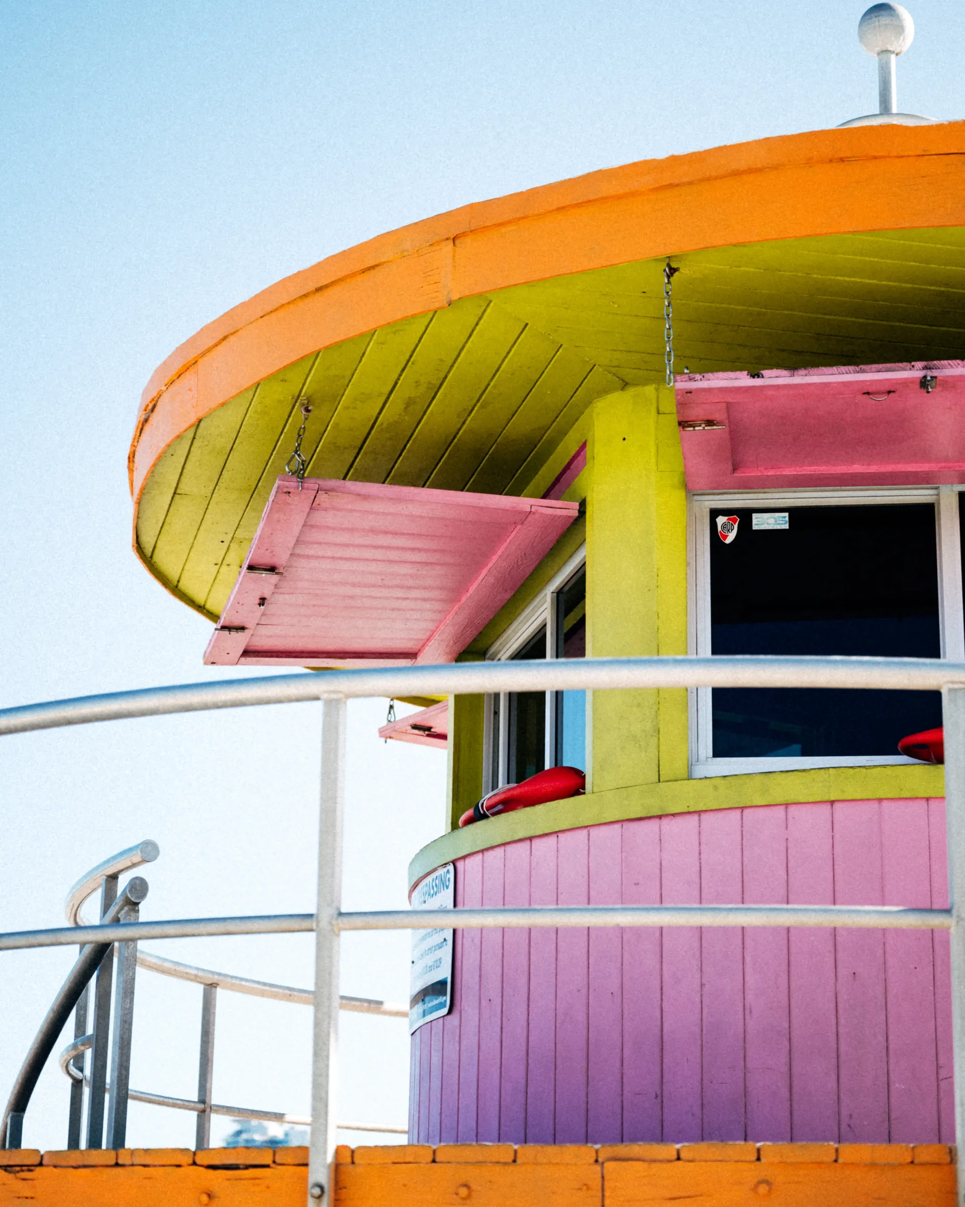 Lifeguard tower in Miami Beach with vibrant colors and blue sky