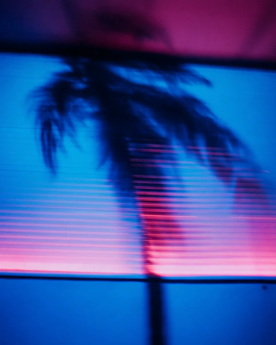 MiamiNeon palm tree silhouette with pink and blue gradient lighting in Miami nightlife aesthetic