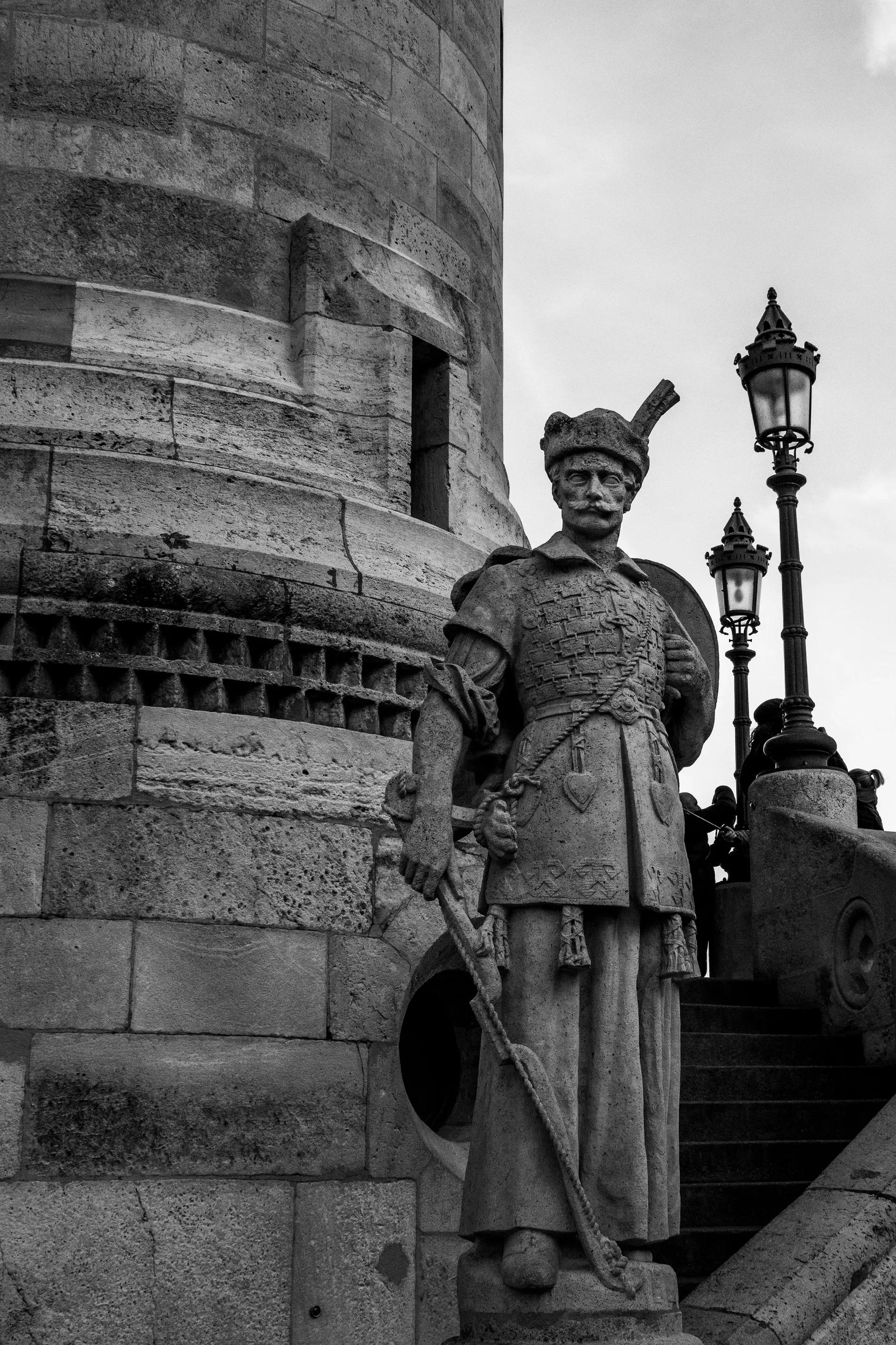 Historic statue at Fisherman's Bastion in Budapest in black and white.