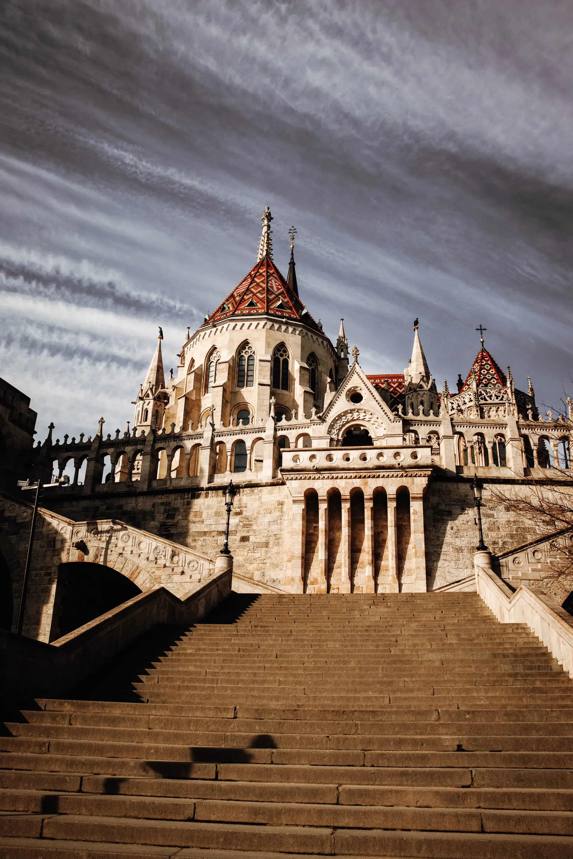 Front view of the Hungarian Parliament Building with dramatic skies in Budapest.