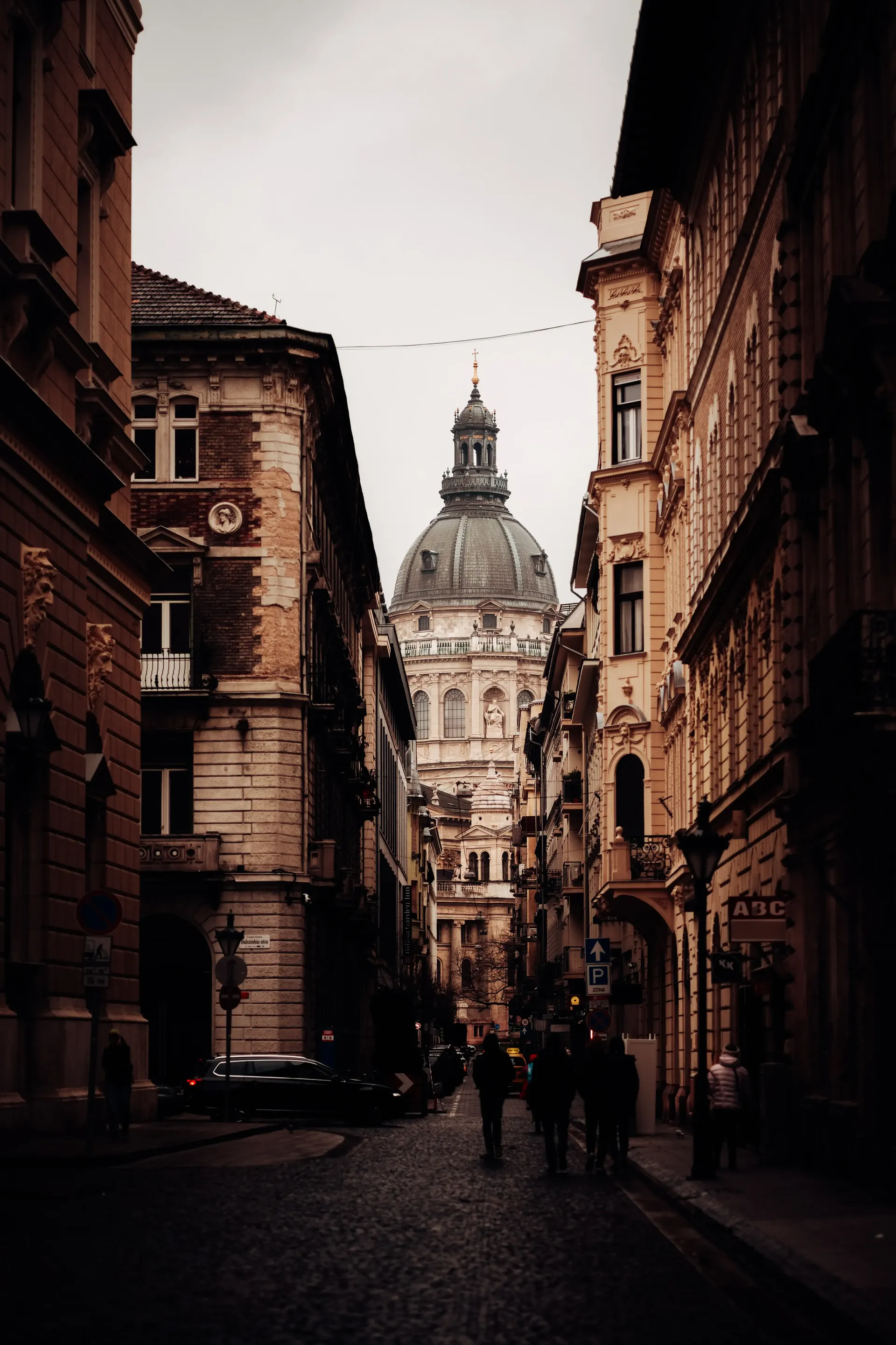 Street view leading towards St. Stephen's Basilica in central Budapest.