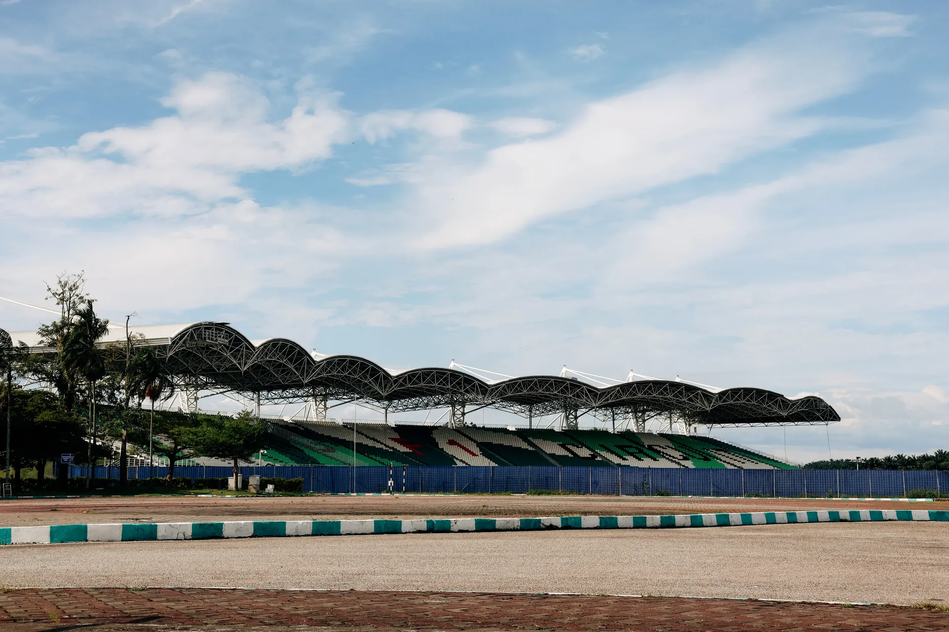 Sepang International Circuit with the grandstands and blue sky in the background