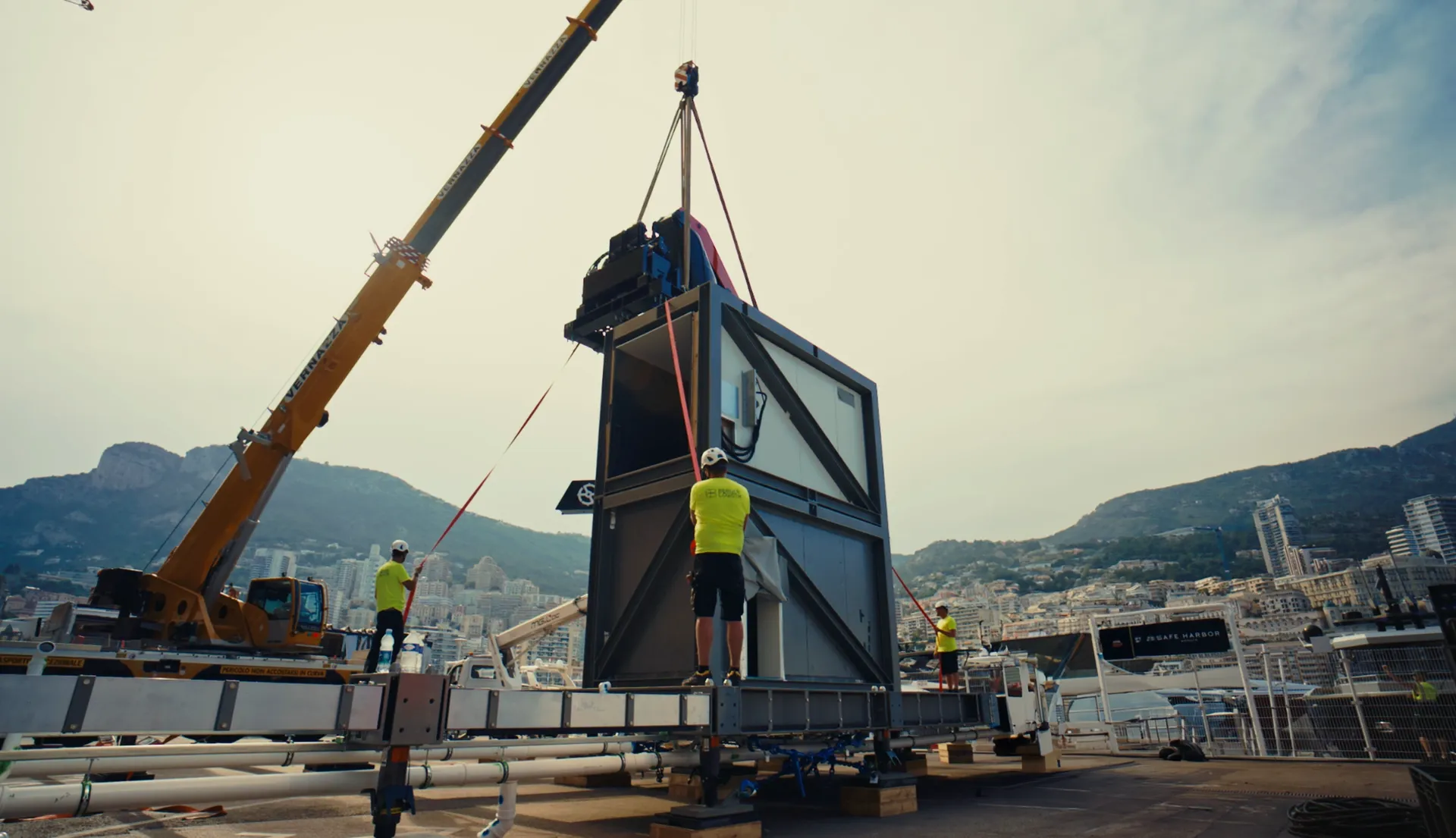 Audi Revolut F1® Team transport truck loading equipment at Monaco harbor before departure to Barcelona