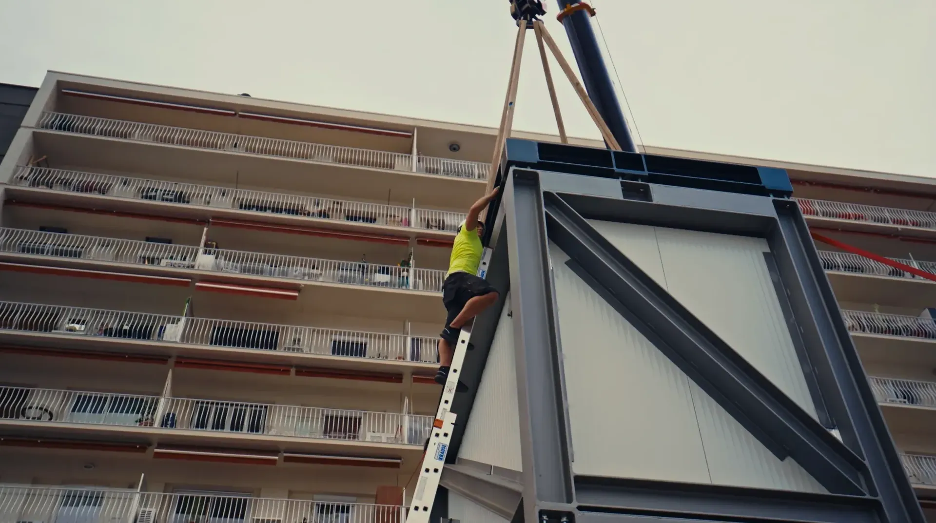 Close-up of Audi Revolut F1® Team logistics crane lifting race container in Monaco
