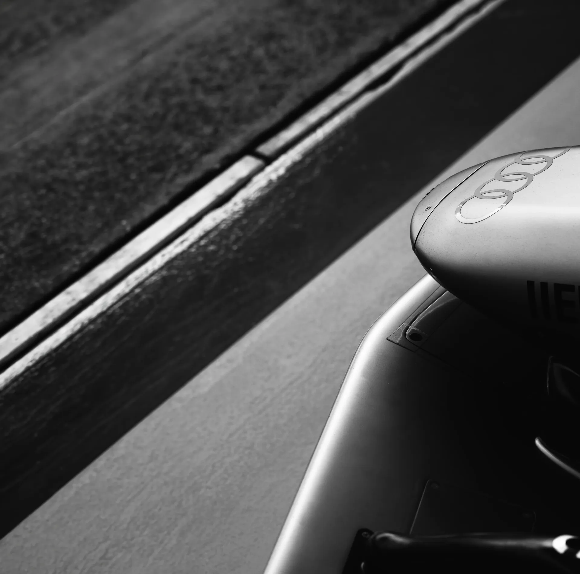 Black and white front wing Close up  Audi Revolut F1® Team car at the pitstop lane