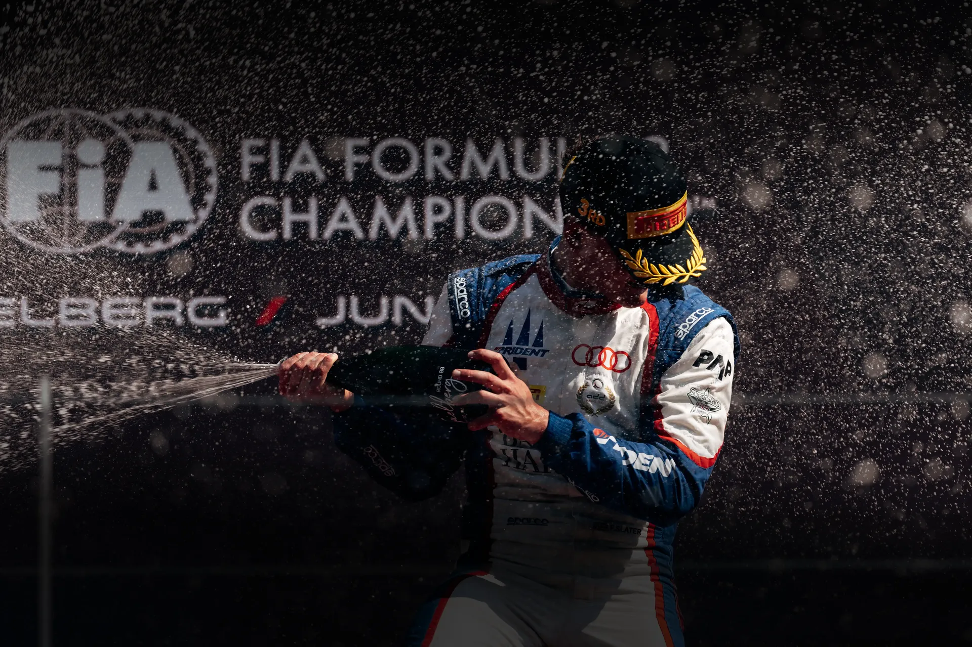 Close up of Formula 3 driver Freddie Slater celebrating an FIA Formula Regional championship as part of the Audi Revolut F1® Team Driver Development Programme announcement.