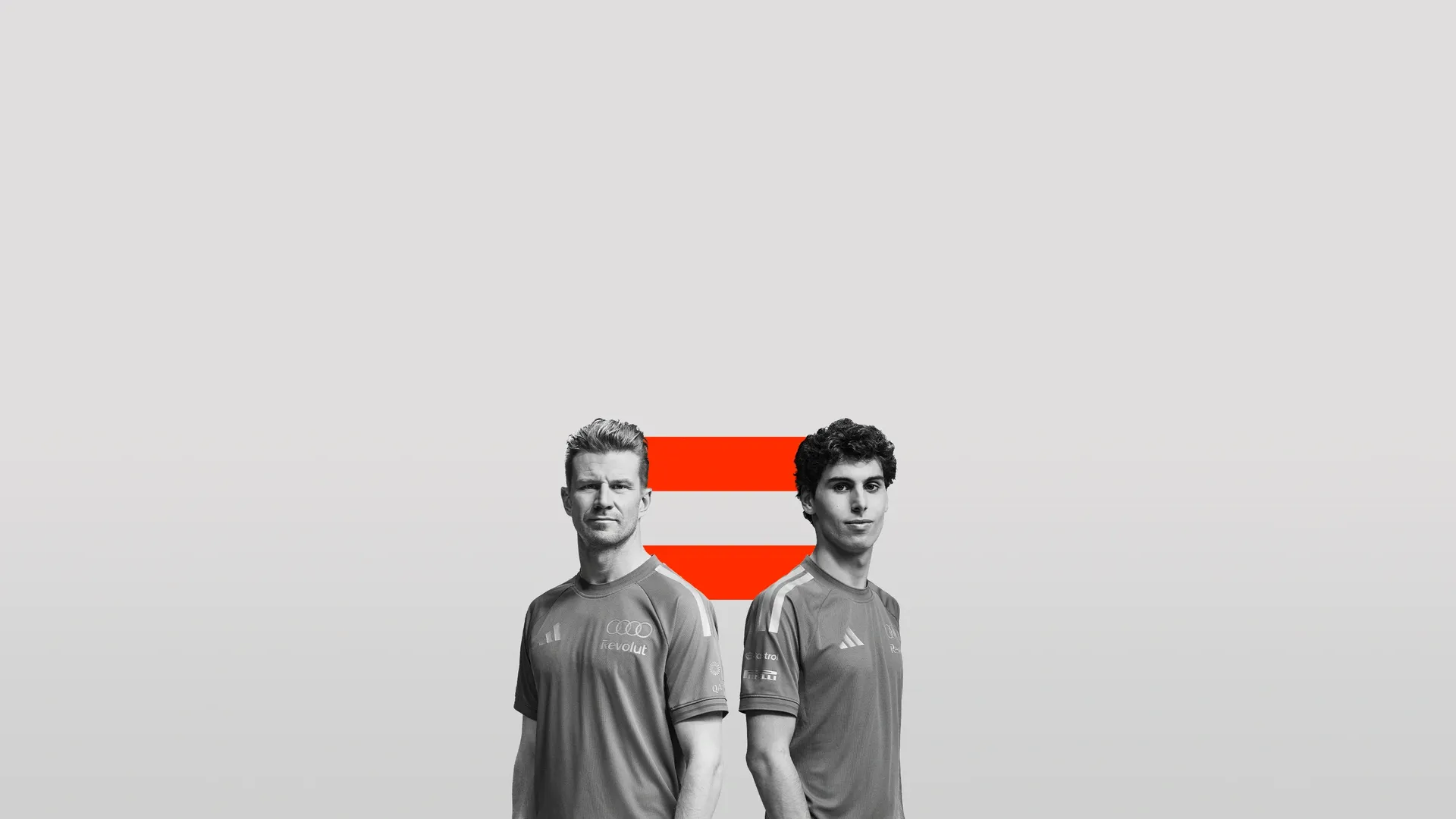 Black and white shot of Nico ulkenberg and Gabriel Bortoleto drivers at the Audi Revolut F1® Team side by side in the studio