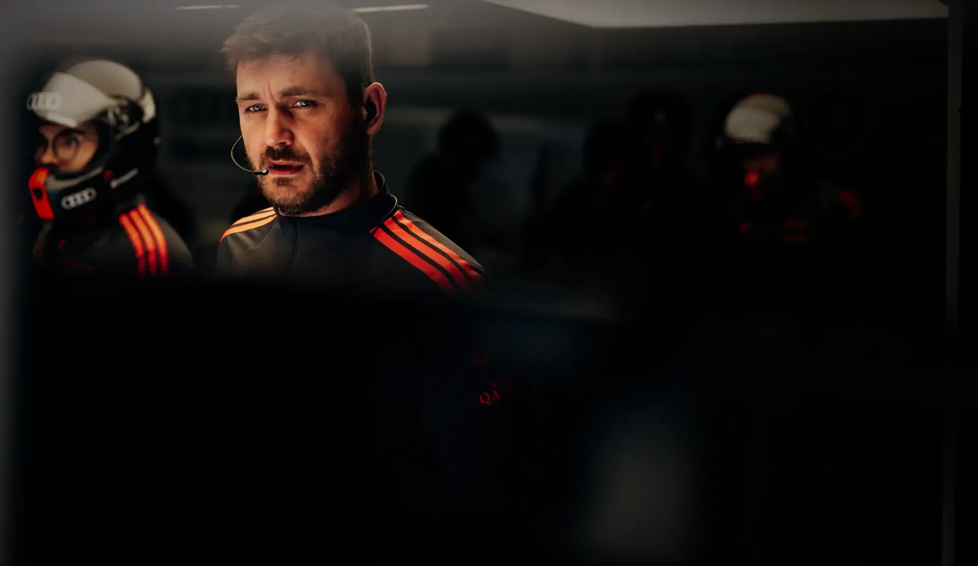 Close up of mechanic crew member inside the Audi Revolut F1® Team garage calm mood very precise and concentrated