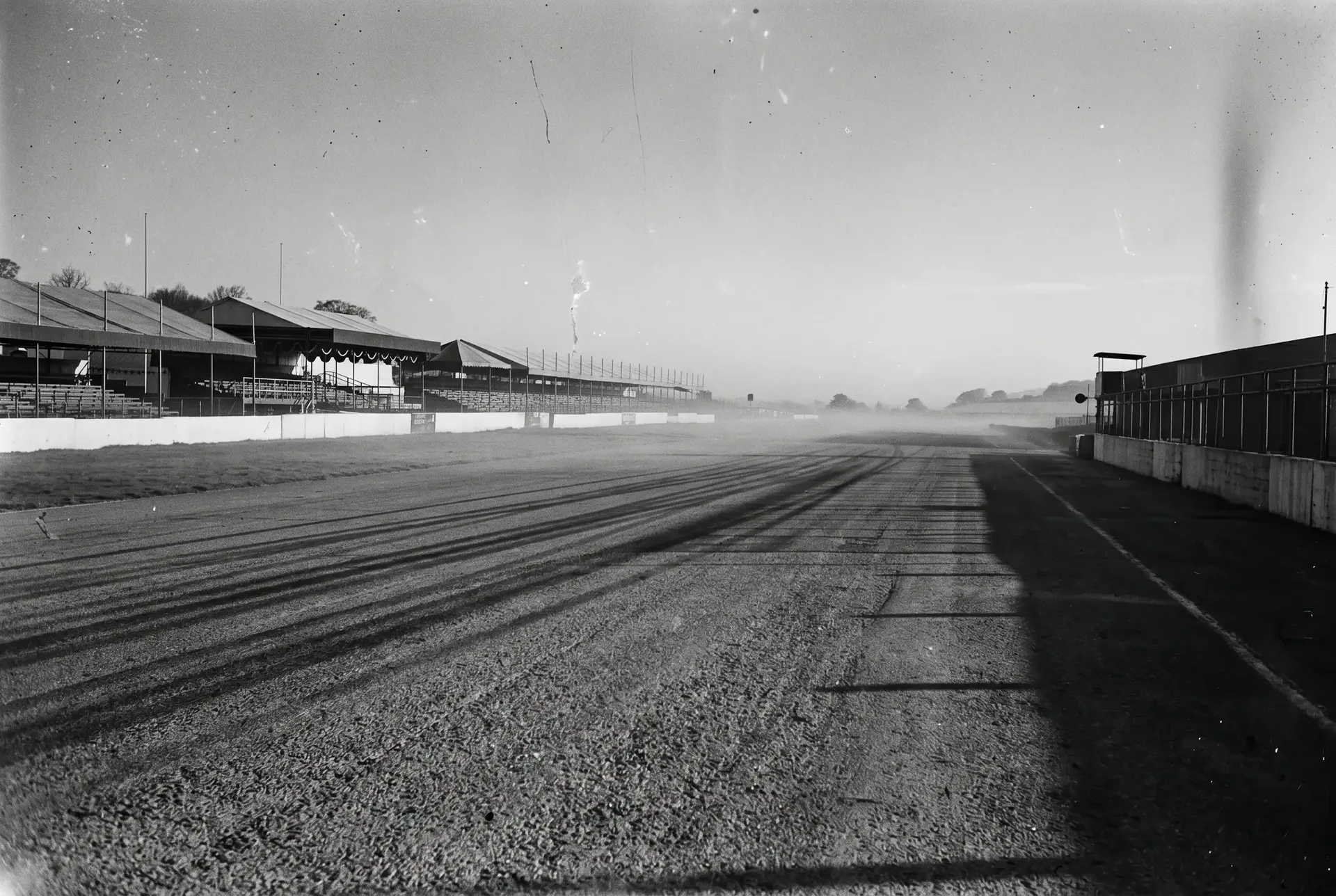 Historic black-and-white view of the original Silverstone start-finish straight.