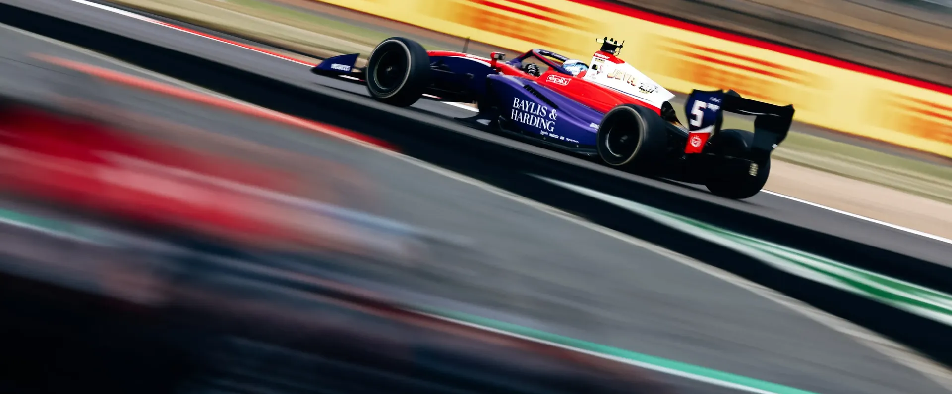 Freddie Slaters Formula 3® car racing on track at Madring circuit