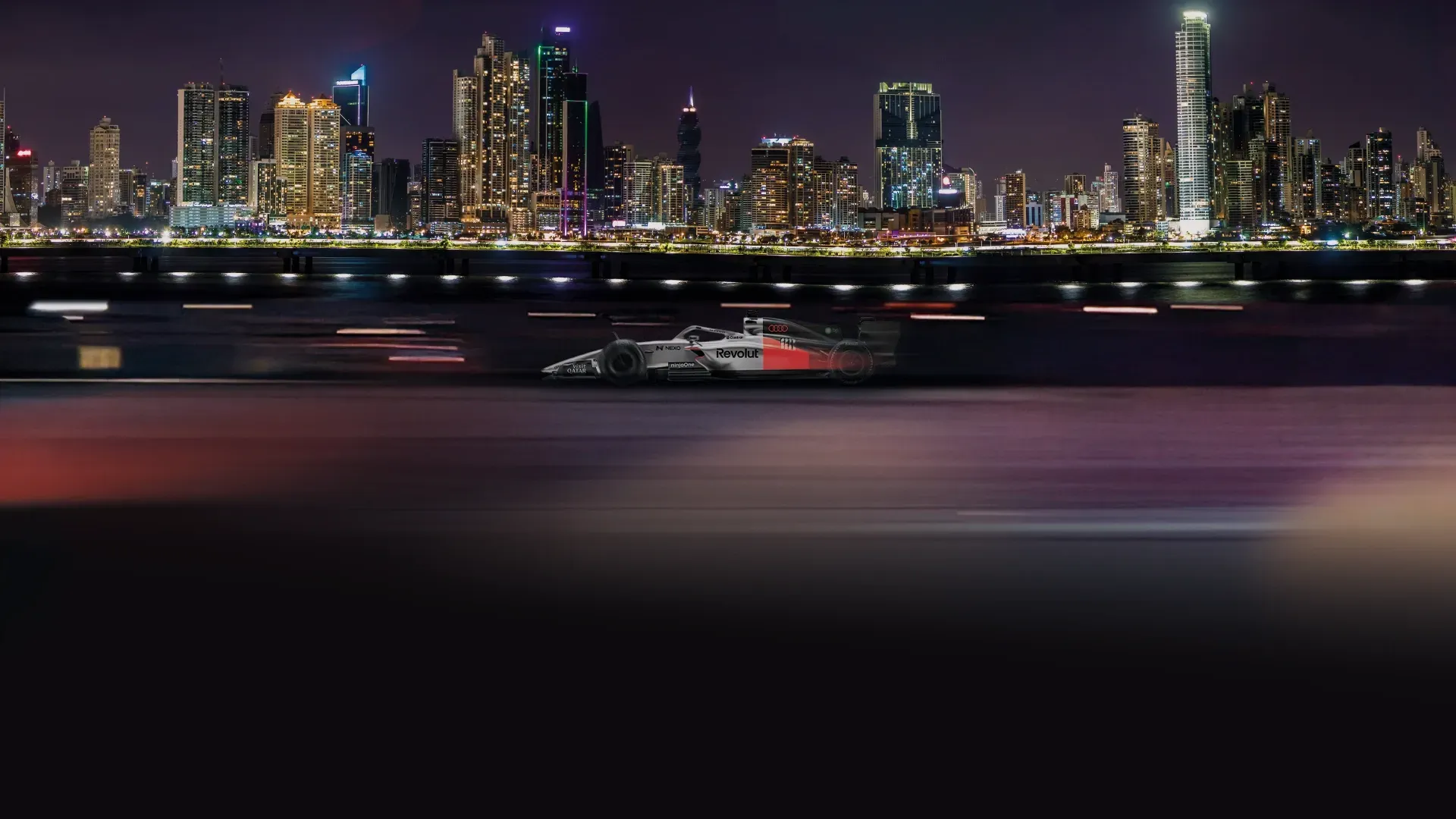 Side view of the Audi Revolute F1 Team R26 car in studio