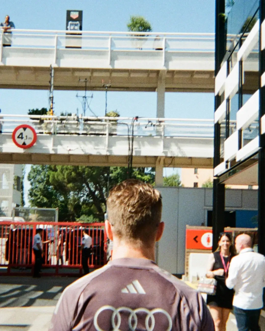Niko Hulkenberg walks through the paddock.
