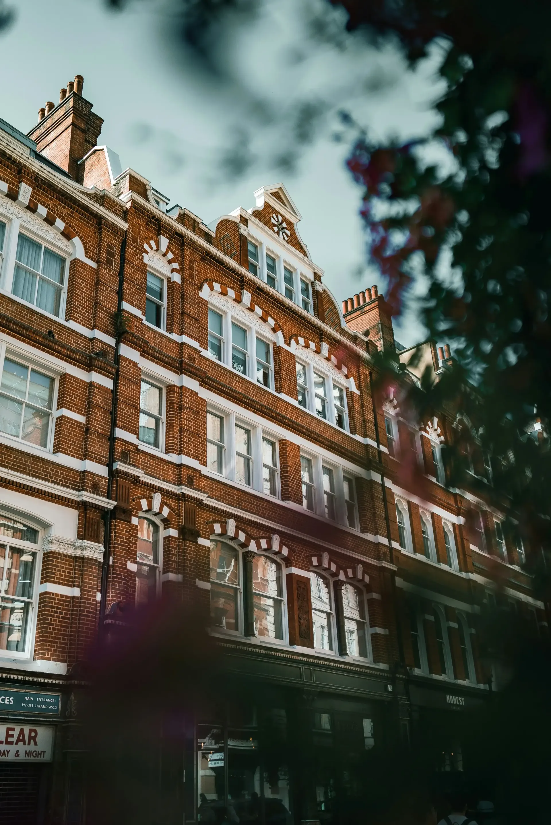 Classic English brick buildings along a quiet village street.