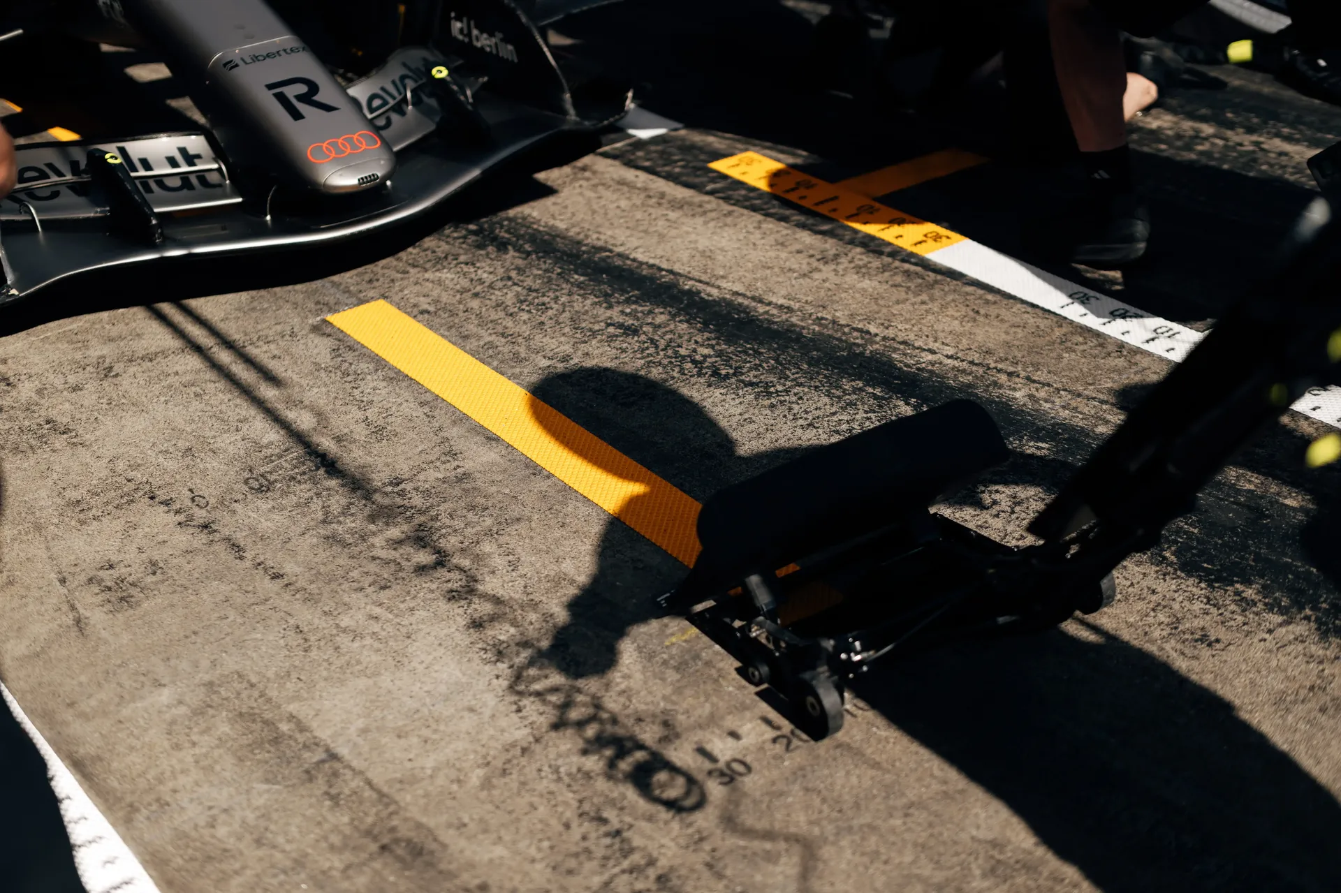 Detail of the Audi R26 in the pit lane.