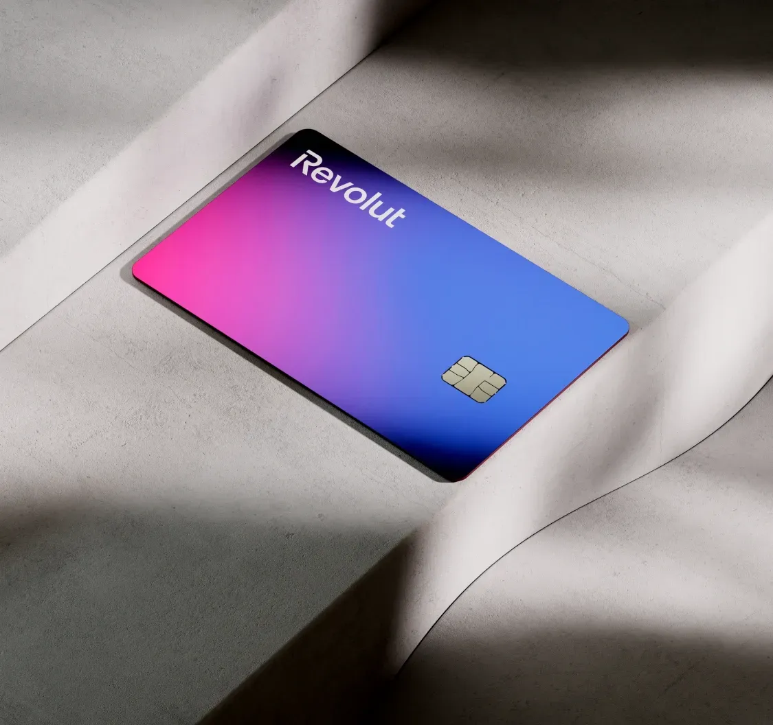 Close up of the Revolut magenta and cyan blue partner card