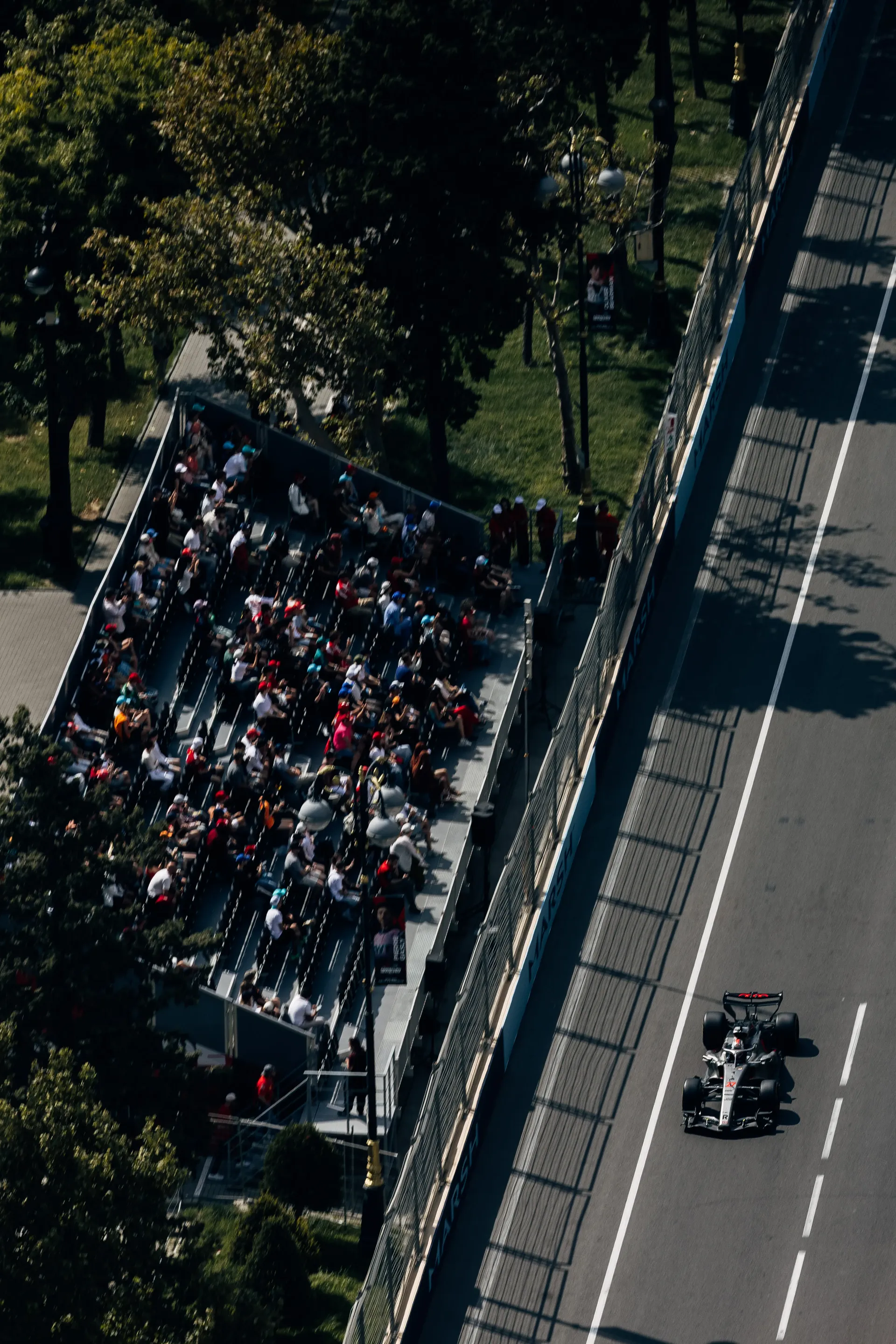 Audi R26 driving past spectators at the Baku City Circuit