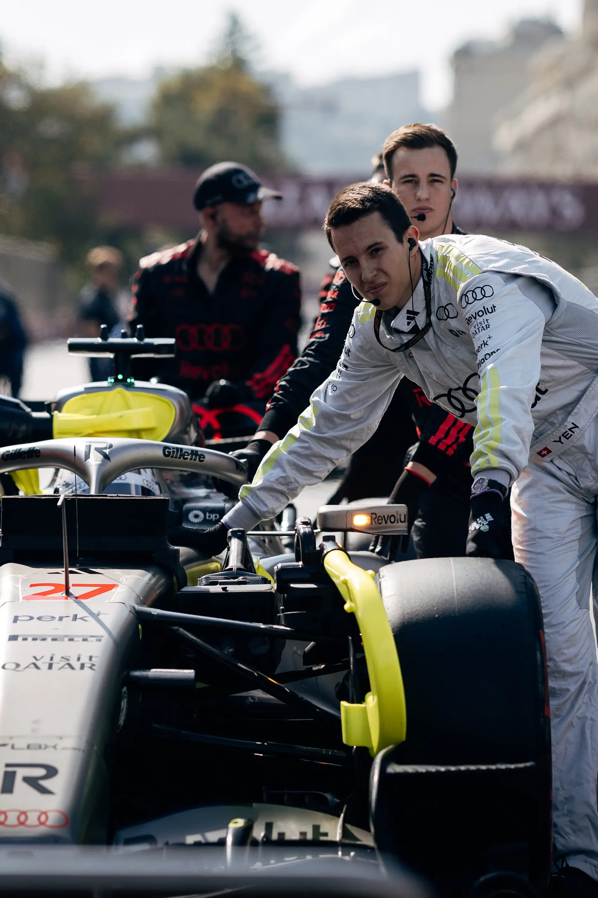 Audi Revolut F1® Team pit stop crew preparing the car in the paddock.