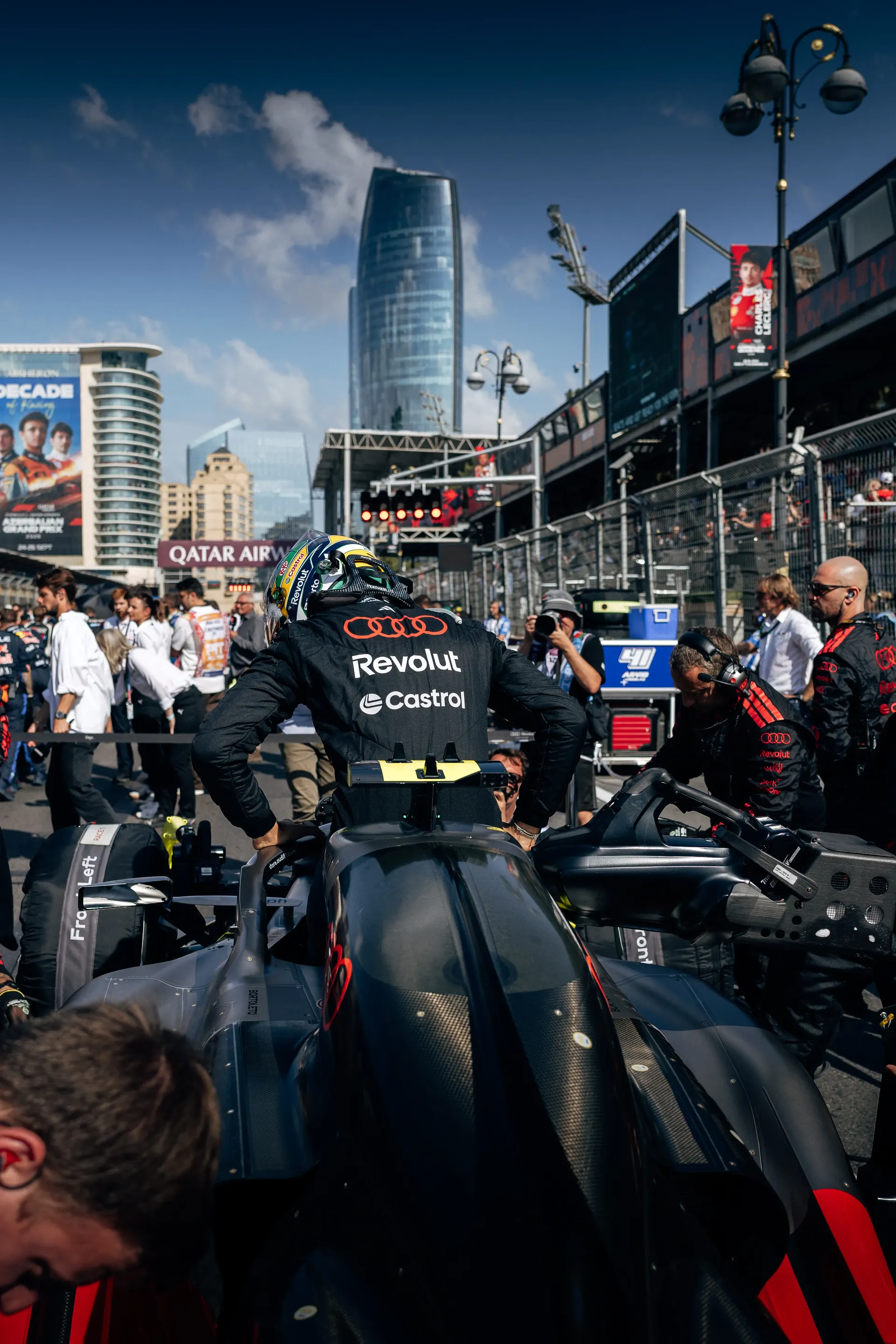 Audi Revolut F1® Team mechanics working around the car on the Baku pit lane.