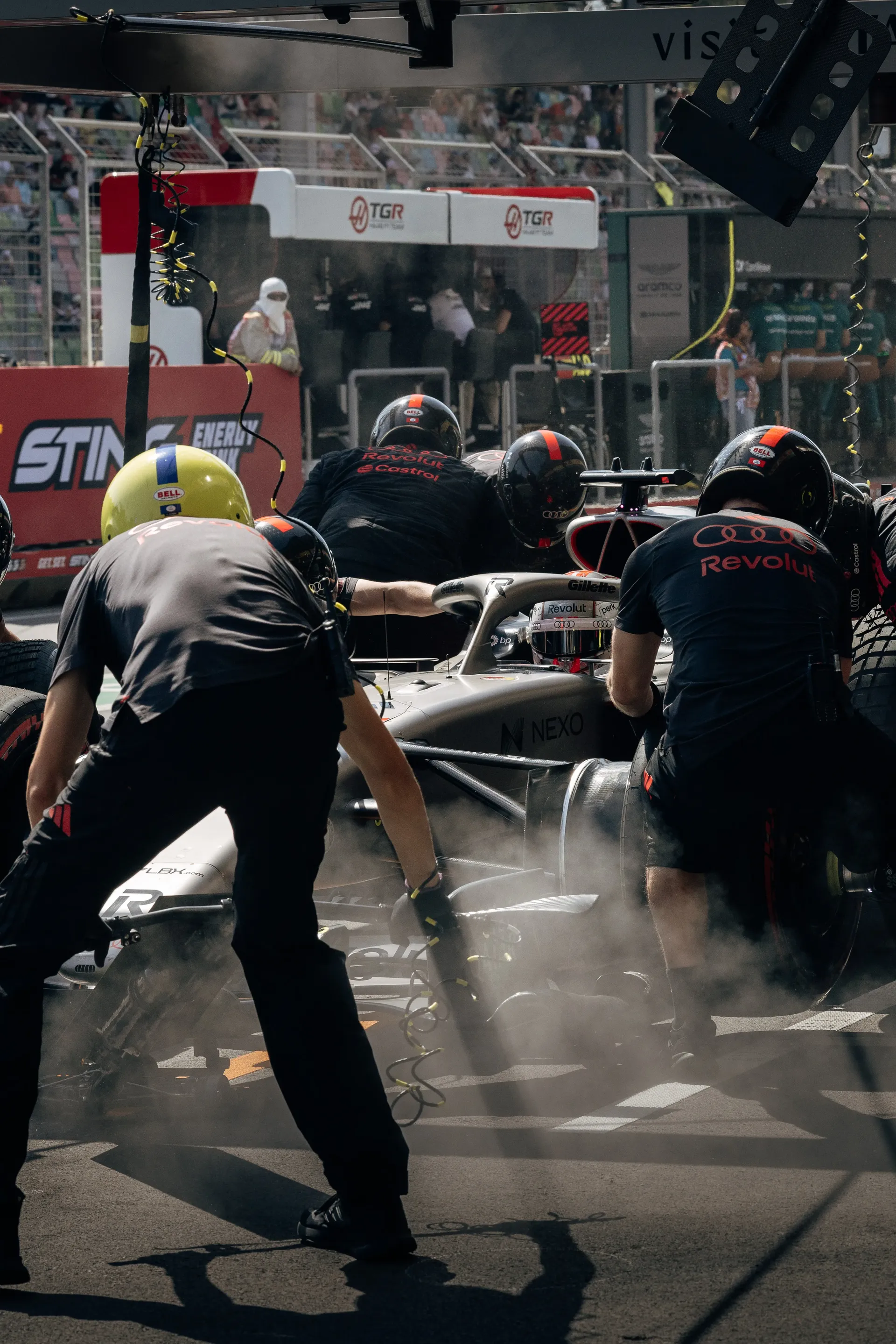 Audi Revolut F1® Team mechanics working on the Audi R26 during Free Practice 1