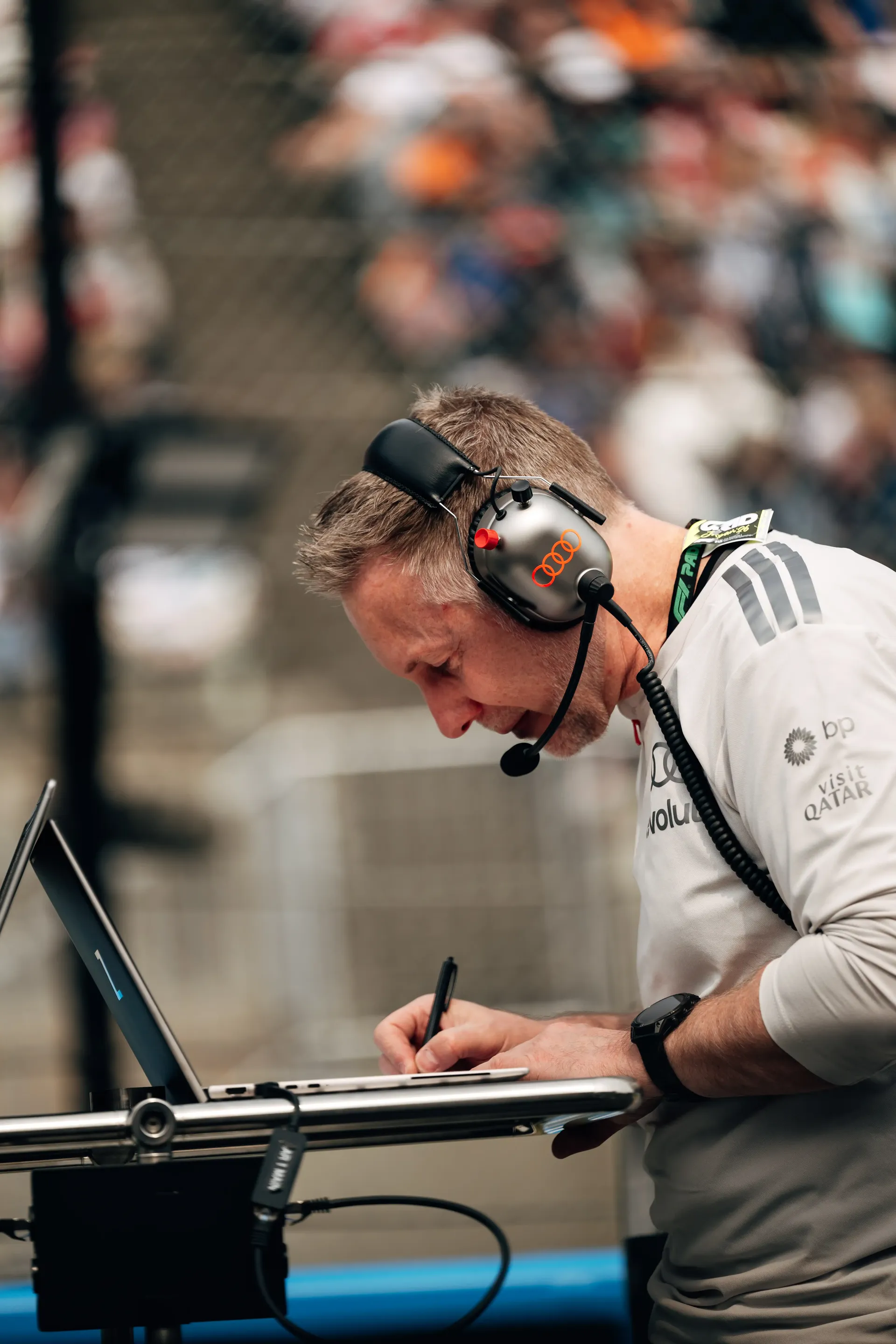 Audi Revolut F1® Team engineer preparing strategic movements on the racetrack
