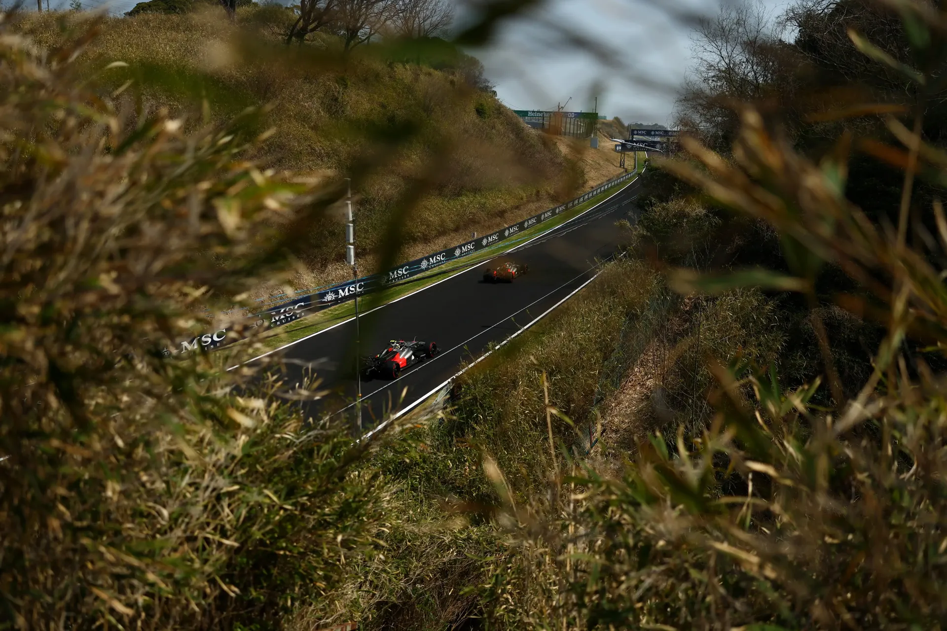 Audi Revolut F1® Team car racing on a long straight racetrack