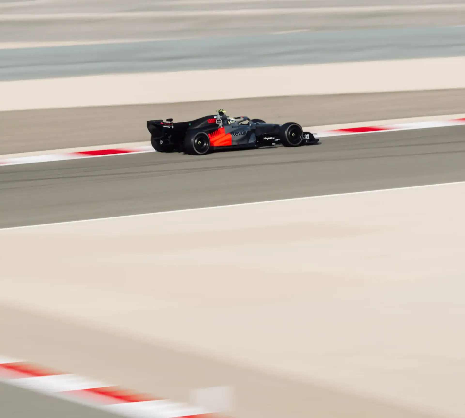 Audi Revolut F1® Team car heading into a sharp corner