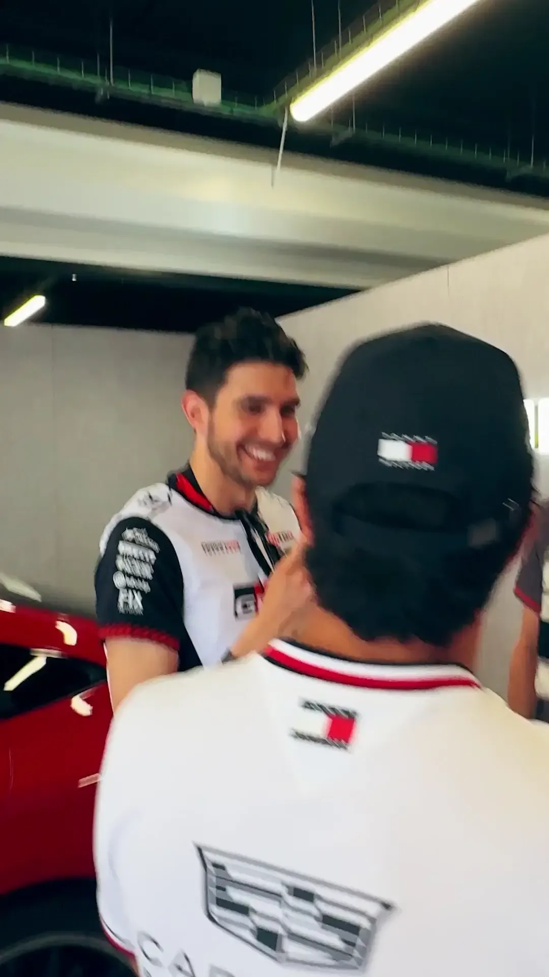 Formula 1 drivers participating in the Barcelona Grand Prix drivers parade, engaging with fans ahead of the race