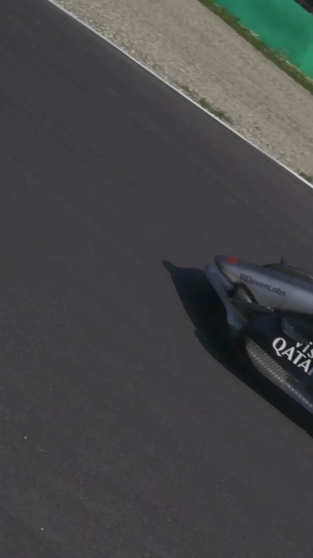 High-energy montage of Audi Revolut F1® Team race day moments in Barcelona, featuring drivers, garage action, and crowd atmosphere