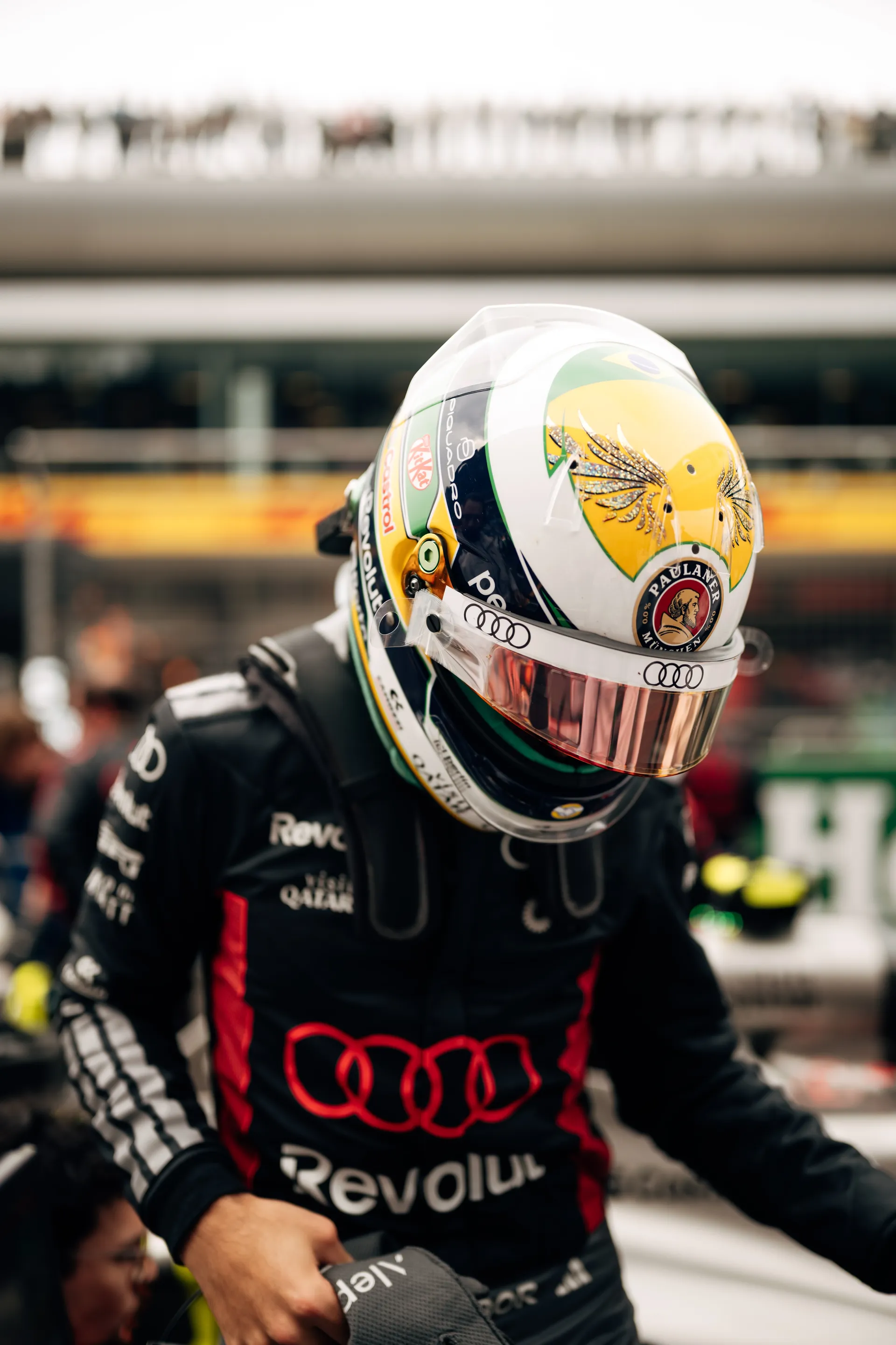 Close up of Gabriel Bortoleto in full Audi Revolut F1® Team race suit and helmet on the grid before the Chinese Grand Prix.