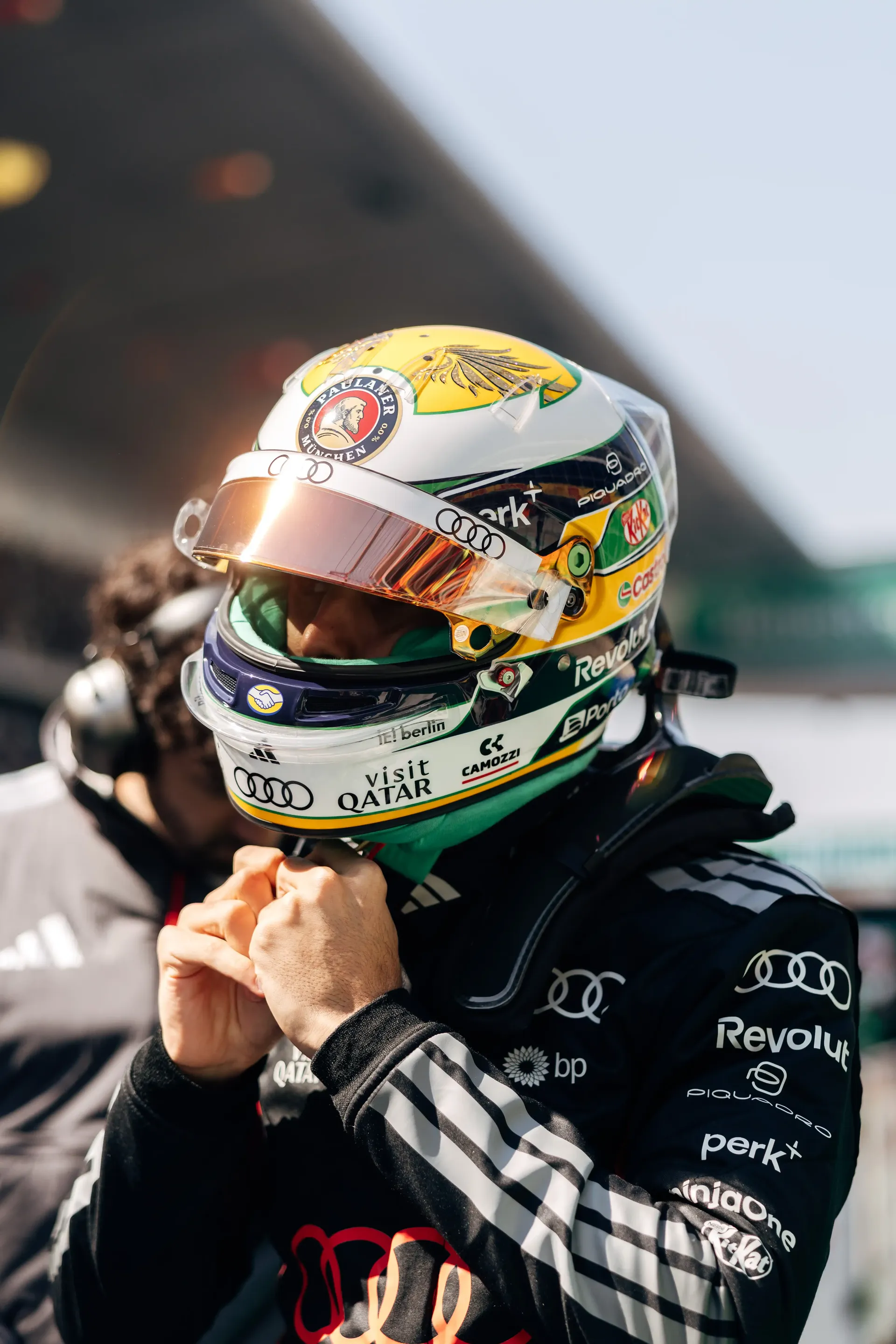 Audi Revolut F1® Team driver Gabriel Bortoleto wearing a helmet and race suit preparing for the sprint session.
