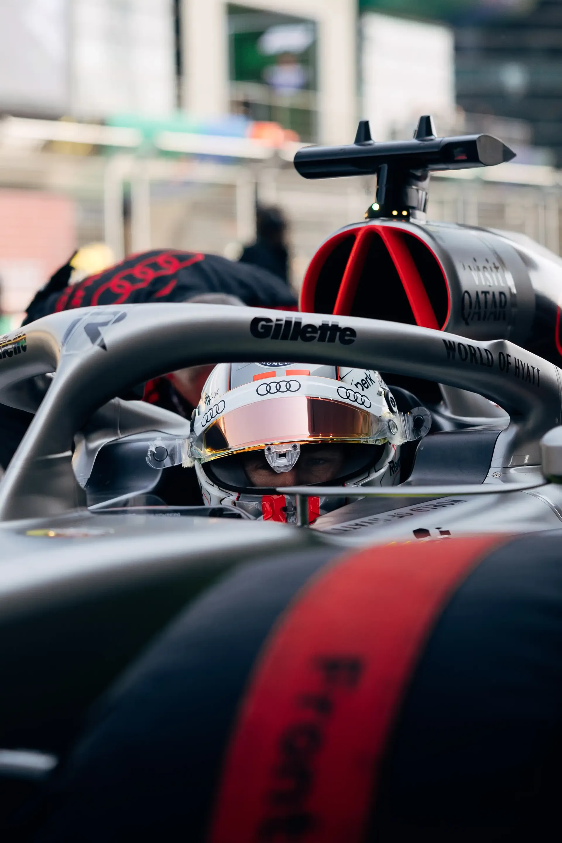 Close-up of the Audi Revolut F1® Team cockpit and halo with the driver seated in the car.
