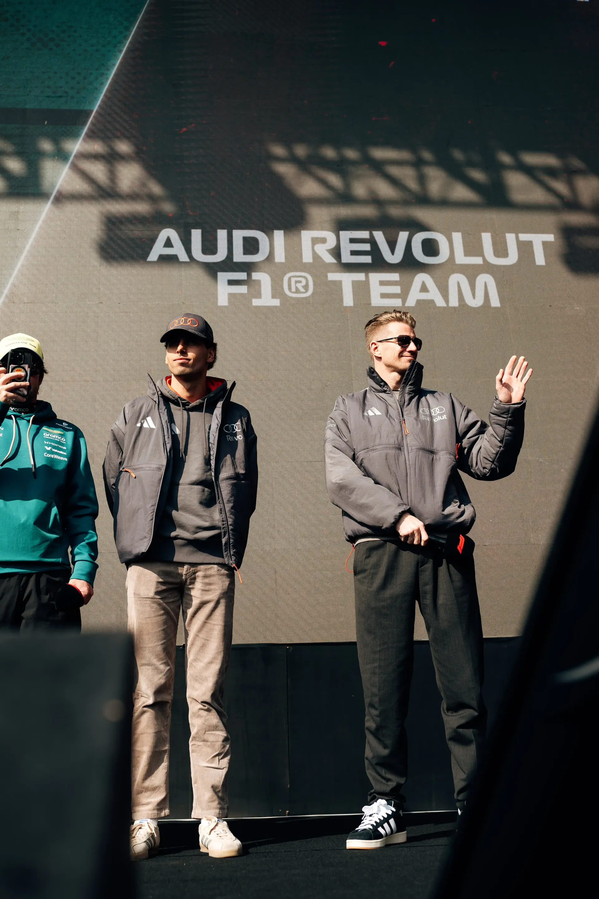 Audi Revolut F1® Team drivers Gabriel Bortoleto left andf Nico Hulkenberg on the right posing together during a stage presentation at the Chinese Grand Prix.