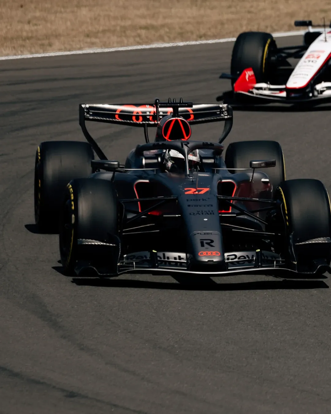Nico Hulkenberg drives the Audi Revolut F1® Team car on track during the Sprint weekend in Shanghai, with another car following behind.