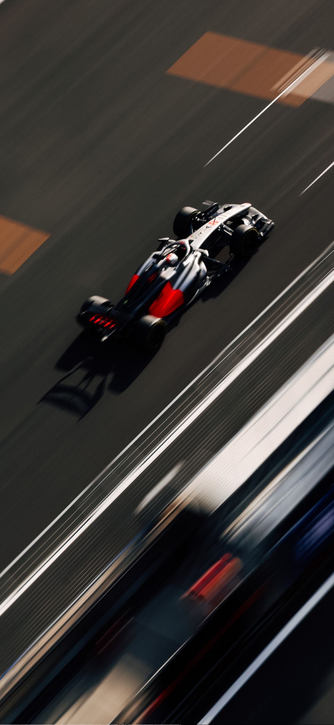 Overhead shot of an Audi Revolut F1® Team car running at speed on the Shanghai circuit during the Chinese Grand Prix weekend.
