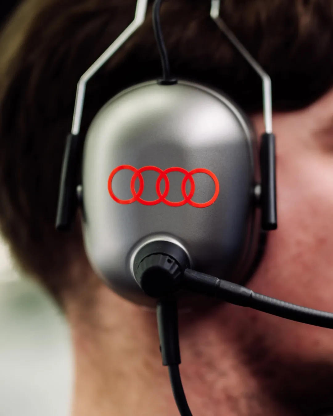 Close up of an Audi branded team headset worn in the garage during Bahrain testing of the Audi Revolut F1® Team