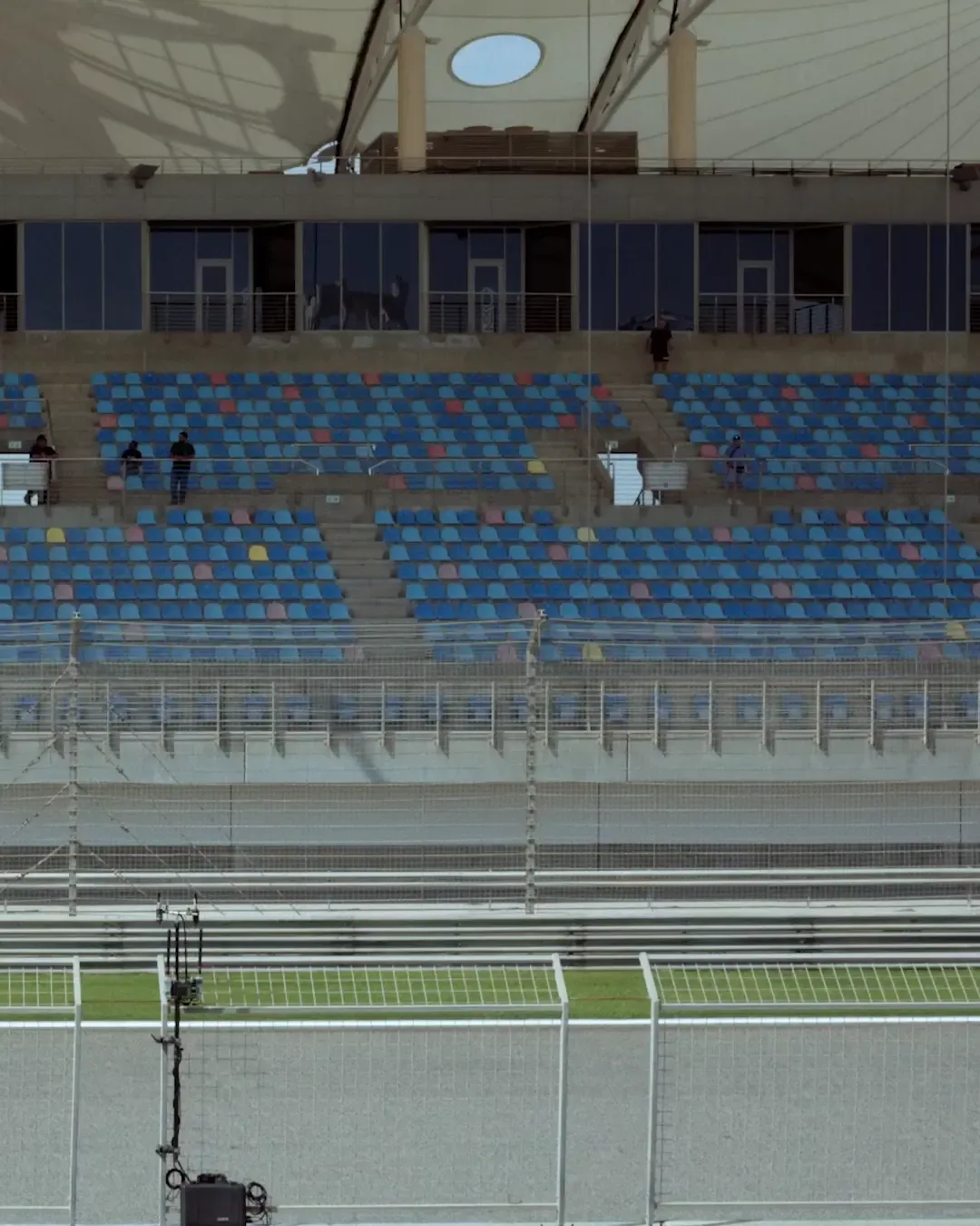 Audi Revolut F1® on the race track, F1 car drives by, coloseum, seats, the big arena
