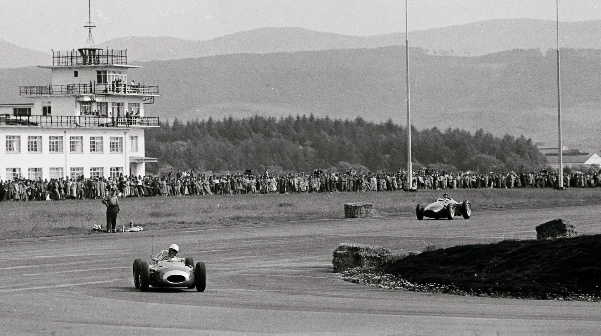 Historic Austrian Grand Prix racing scene at Zeltweg Air Base.