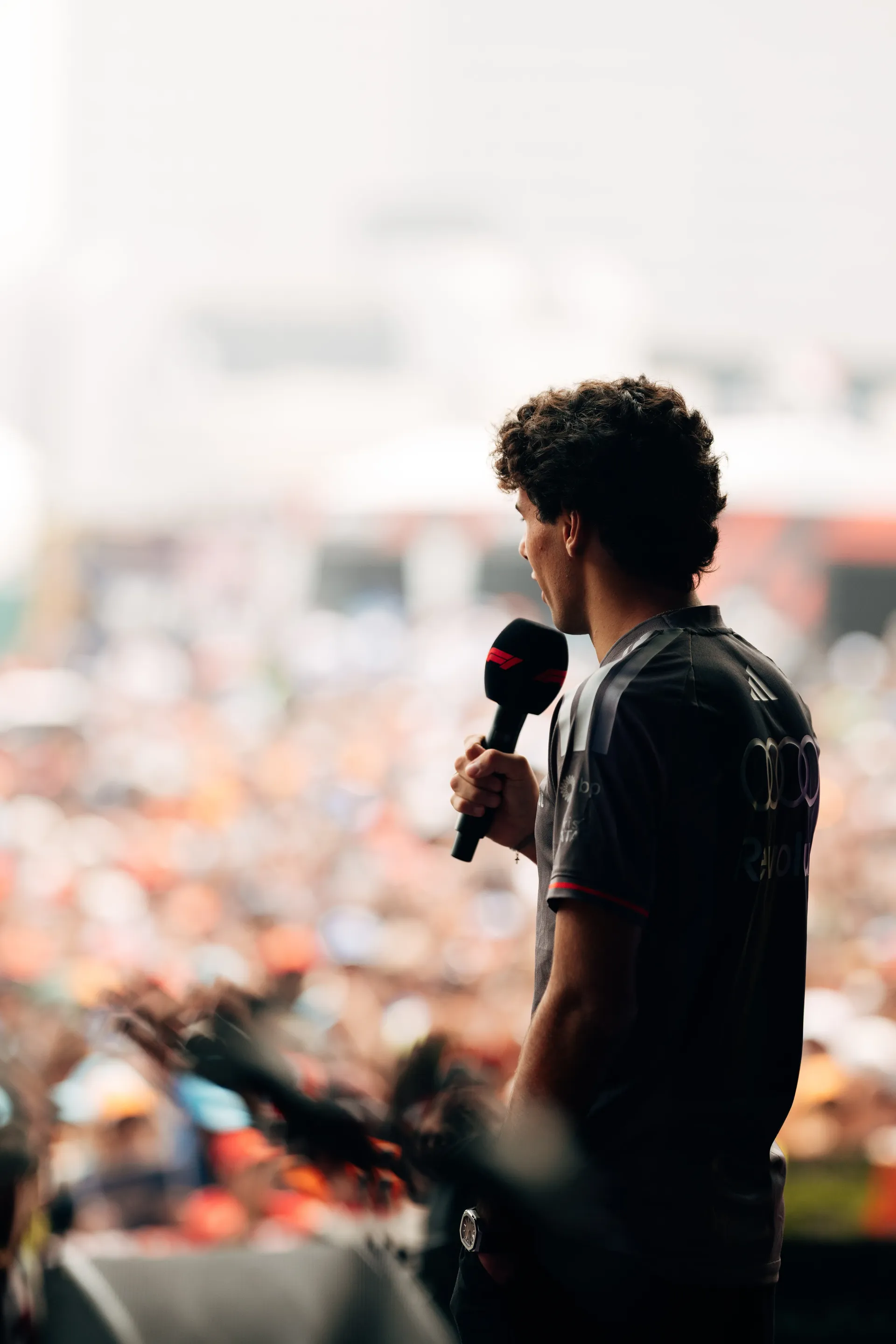 Audi Revolut F1® Team driver Gabriel Bortoleto speaking to fans at the Singapore Grand Prix.